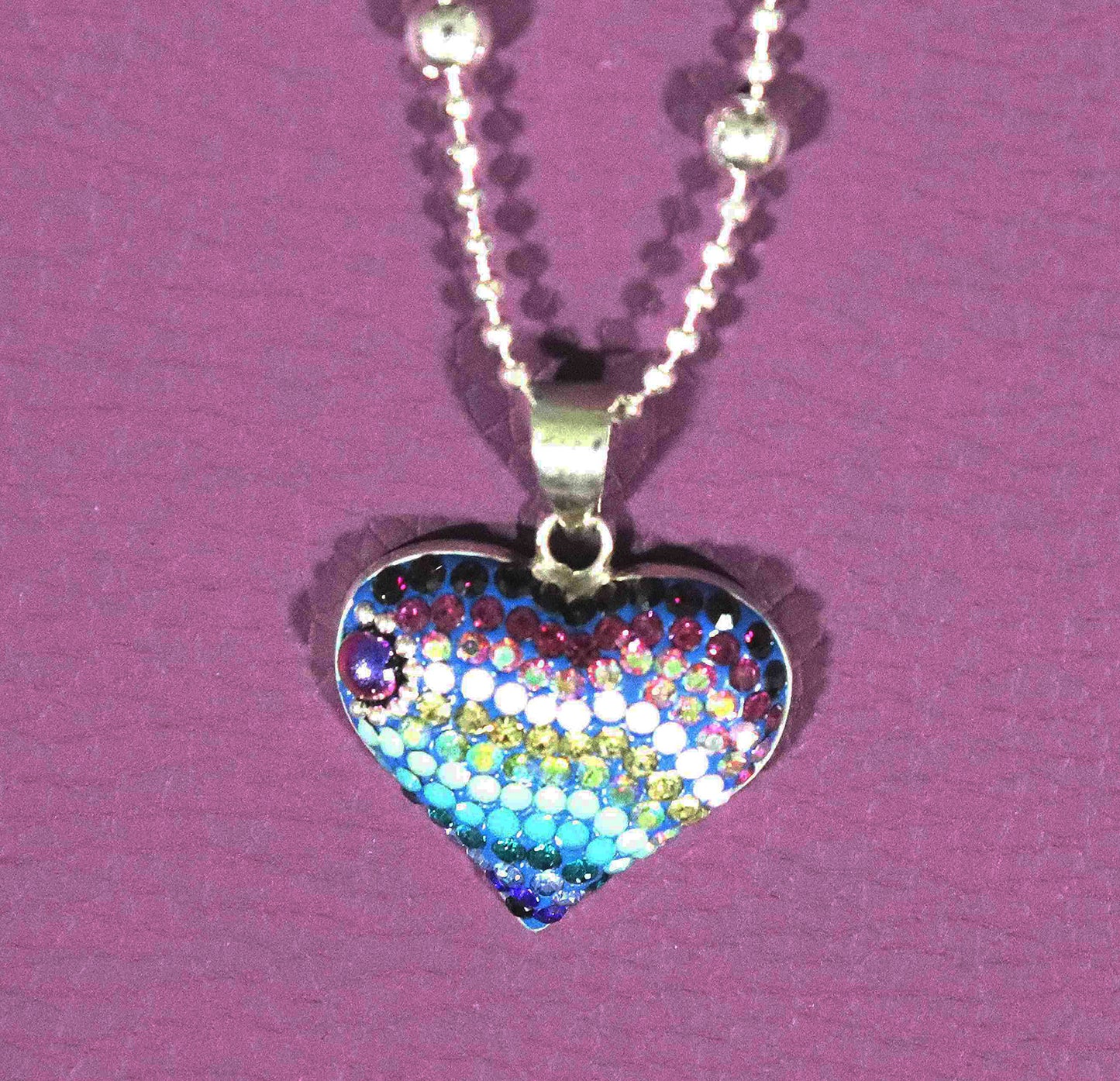 Sparkling Spectrum Rainbow Heart Sterling Silver Necklace with Synthetic Stones.