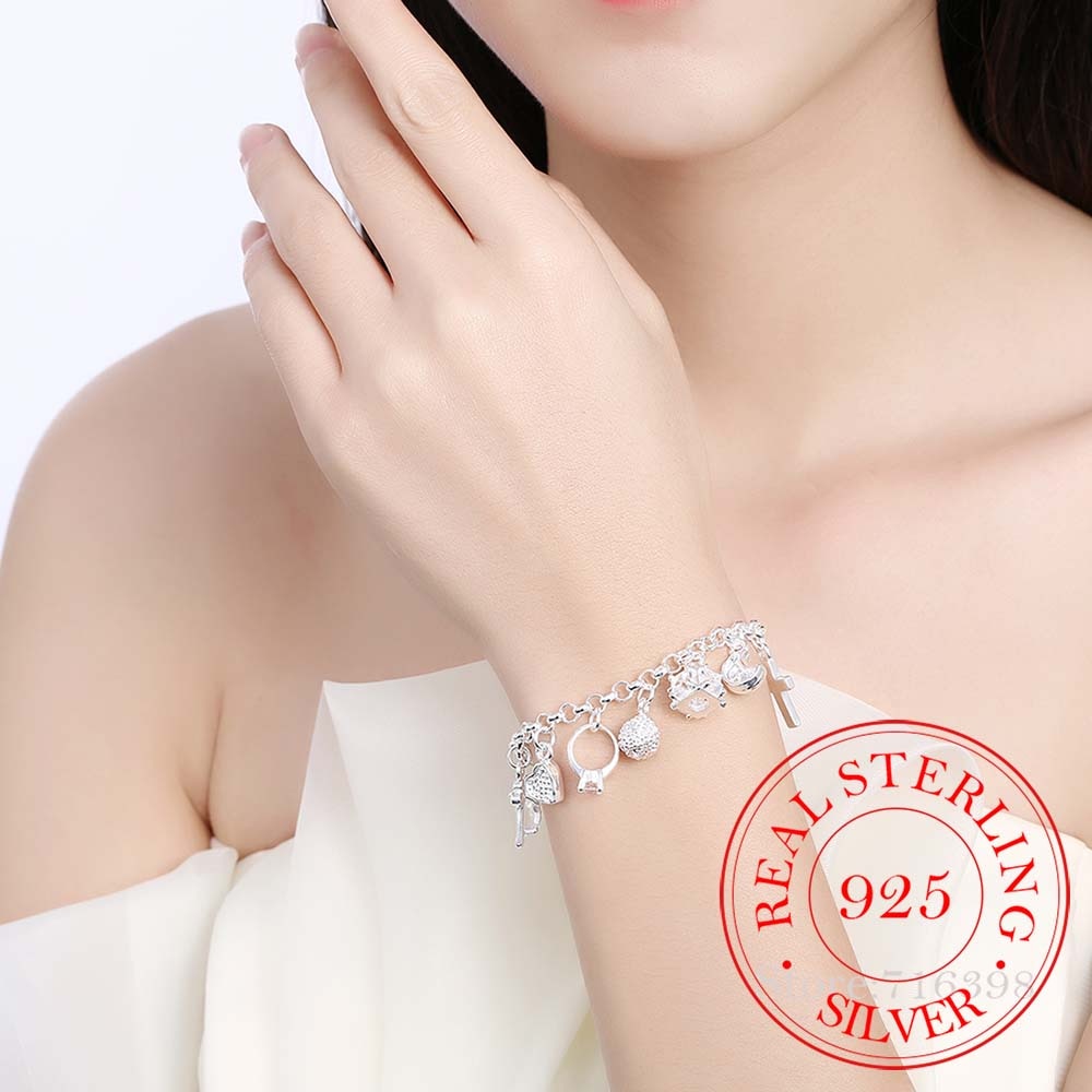 Sterling Silver Charm Bracelet With Assortment Of Multiple Charms