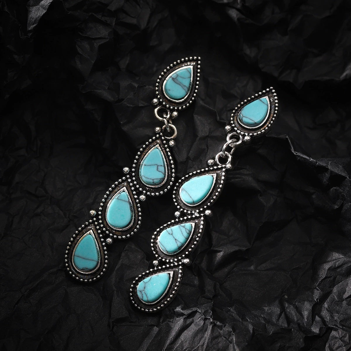 Handcrafted Sterling Silver Paisley Drop Earrings with Synthetic Turquoise Stones