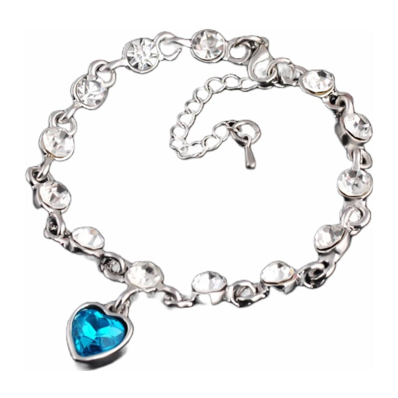 Elegant Sterling Silver Heart Bracelet with Blue Zirconia