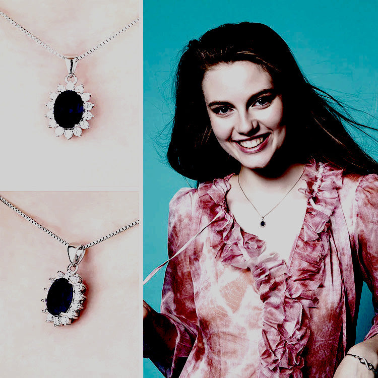Sterling Silver Oval Shaped Lab Created Non-Treated Sapphire Accented with 14 Round Cubic Zirconia Stones on 18" Box Chain. Origin of Stone Switzerland