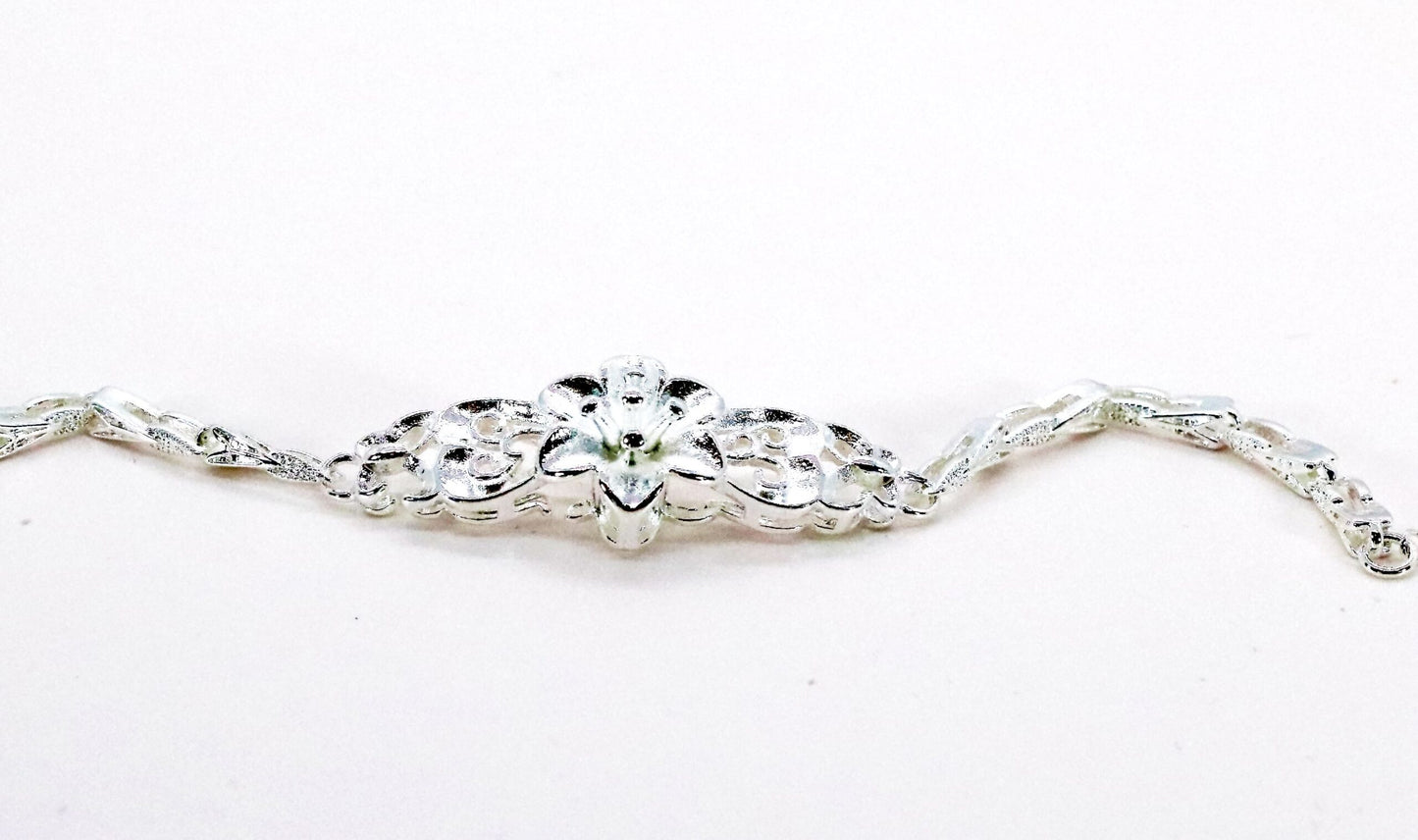 Elegant Sterling Silver Bracelet with Flower Detailing