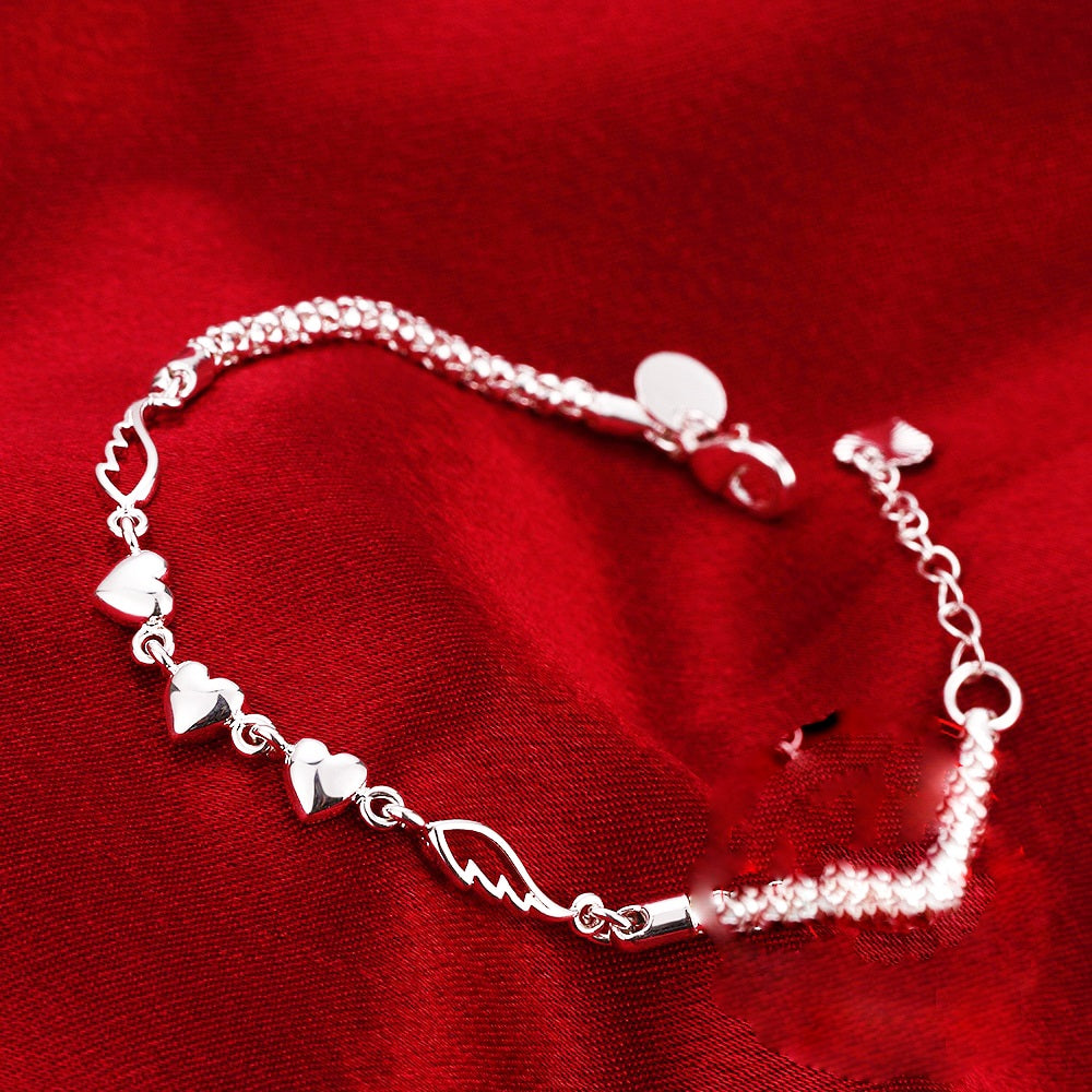 Elegant Sterling Silver Heart and Angel Wing Bracelet