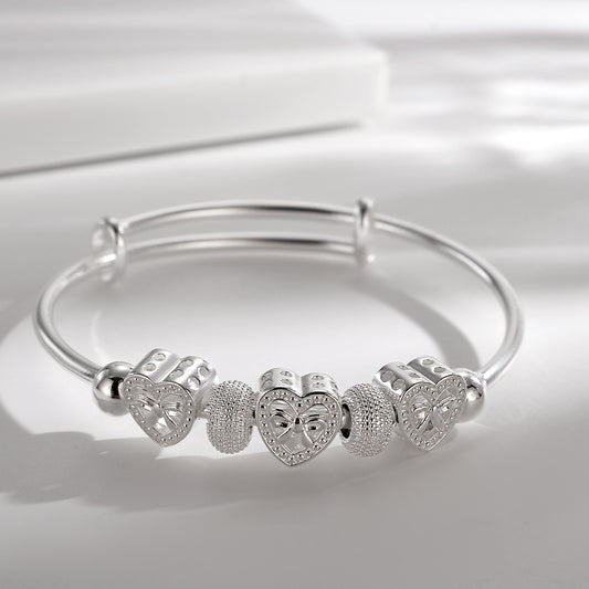 Elegant Sterling Silver Heart Charm Bracelet with Adjustable Bangle