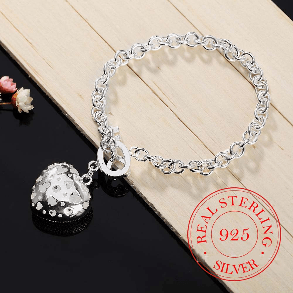 Key to My Heart Sterling Silver Puffed Heart Bracelet with Cut-Out Hearts & Florentine Finish