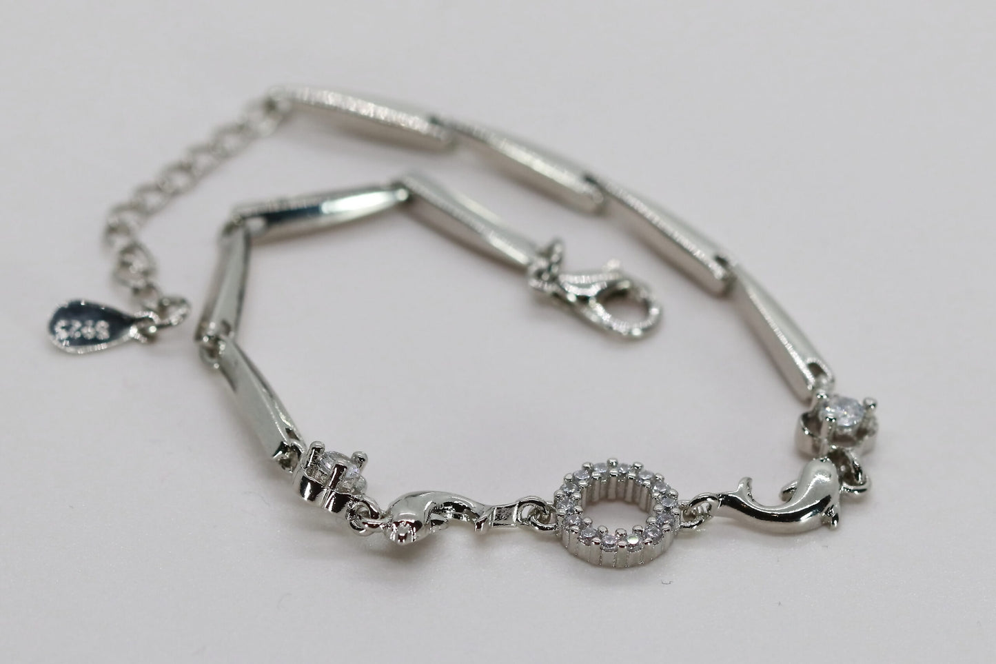 Sterling Silver Rhodium Finish Bar Link Bracelet With Two Dolphins Accented With CZ 7"