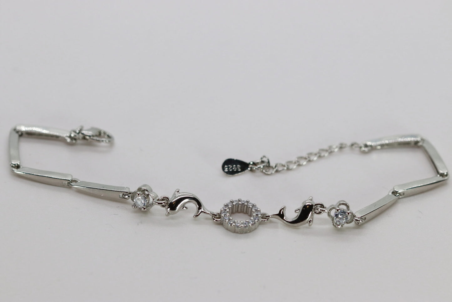 Sterling Silver Rhodium Finish Bar Link Bracelet With Two Dolphins Accented With CZ 7"