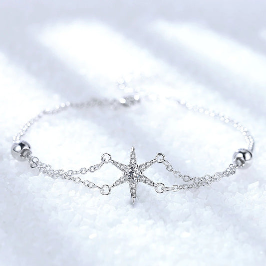 Elegant Sterling Silver Bracelet with Star Charm and Synthetic Stones