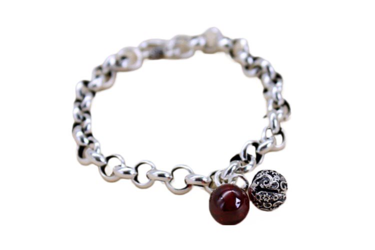 Elegant Sterling Silver Bell Bracelet with Red Stone
