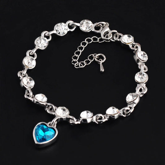 Elegant Sterling Silver Heart Bracelet with Blue Zirconia