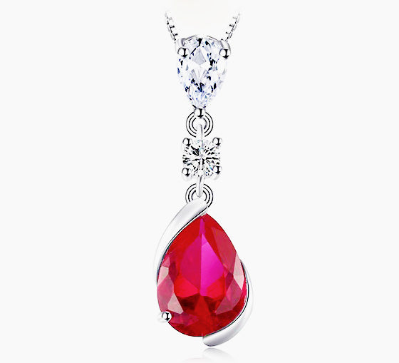 Sterling Silver Pear Shaped Ruby Lab Created Non-Treated Accented with Two Round Cubic Zirconia Stones on 18" Box Chain. Origin of Stone China