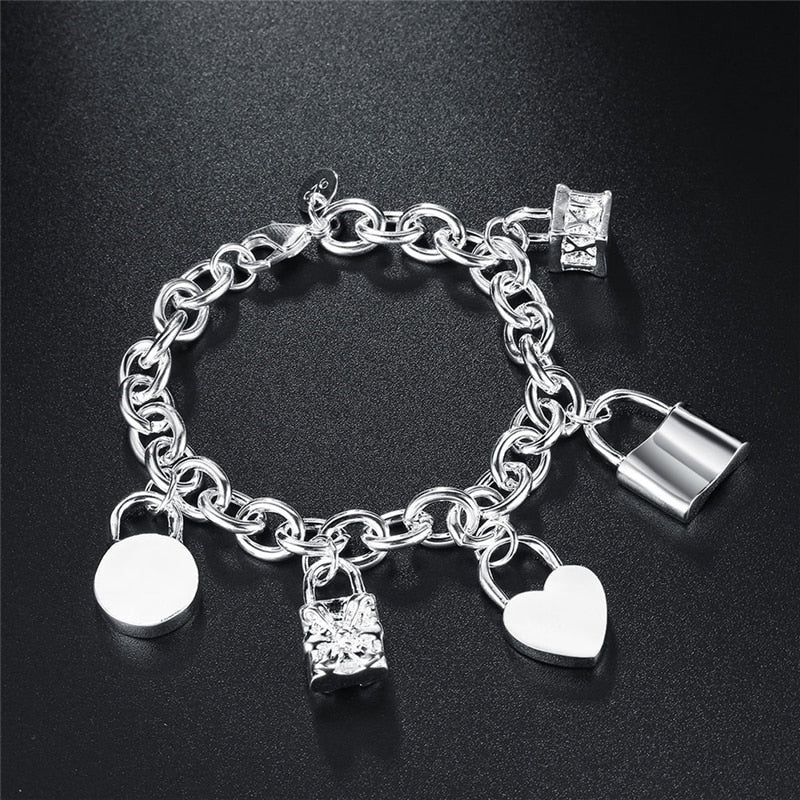 Beautiful Sterling Silver Charm Bracelet with an Assortment of Charming Heart, Square, and Lock Charms