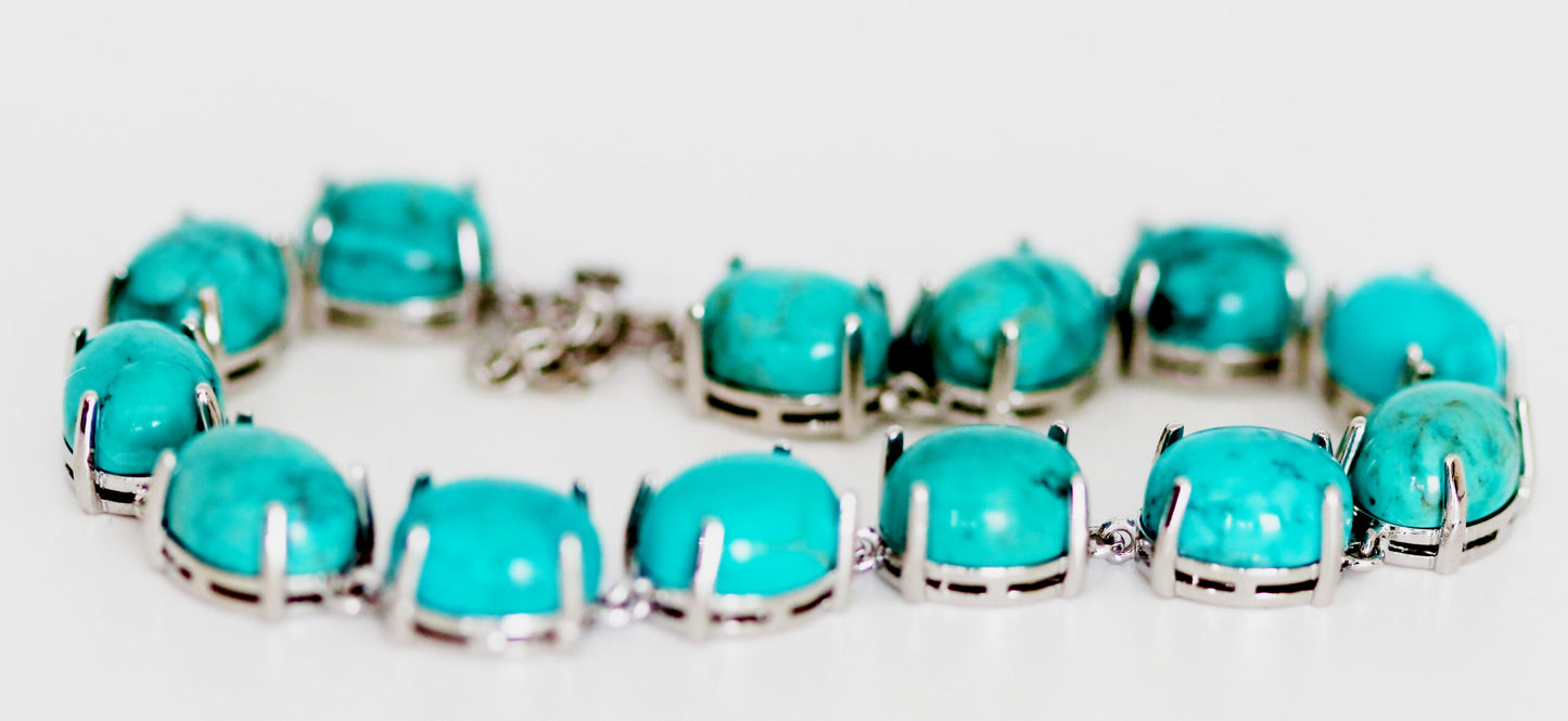 Stunning Handcrafted Sterling Silver Bracelet with Oval Natural Turquoise Gemstones