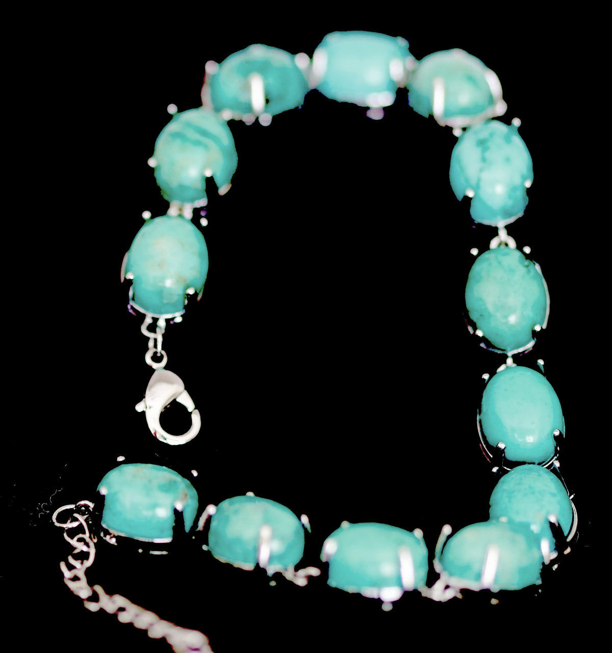 Stunning Handcrafted Sterling Silver Bracelet with Oval Natural Turquoise Gemstones