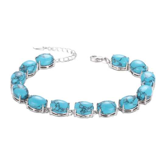 Stunning Handcrafted Sterling Silver Bracelet with Oval Natural Turquoise Gemstones