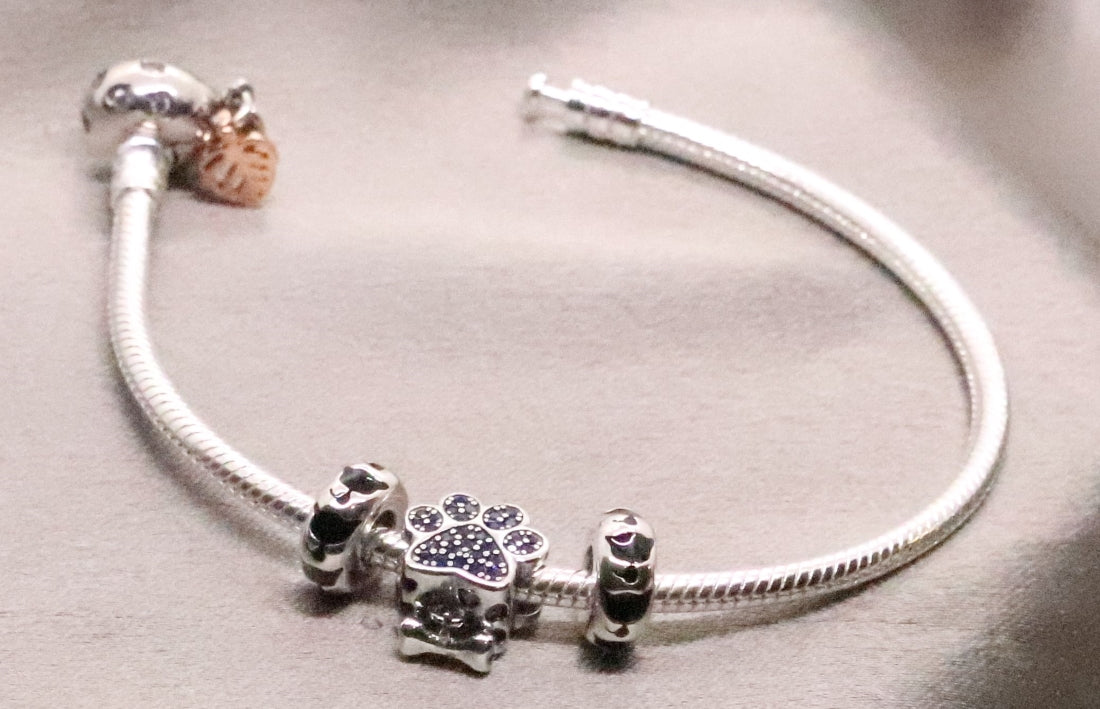 Elegant Sterling Silver Animal Charm Bracelet with Sparkling CZ Accents