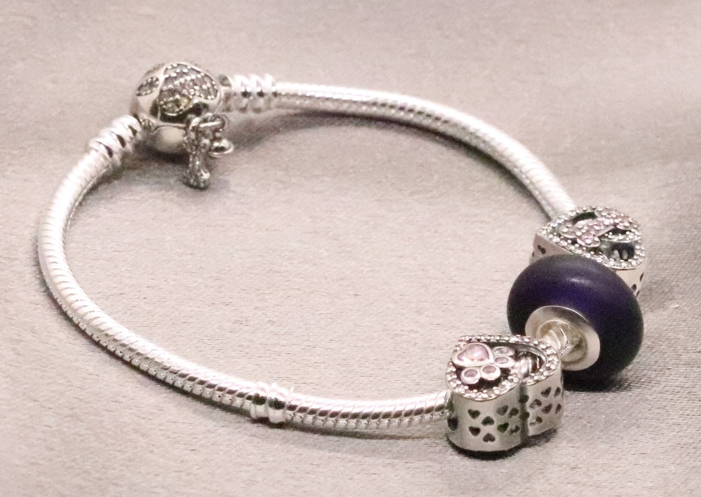 Elegant Sterling Silver Animal Charm Bracelet with Engraved Paw and Bone