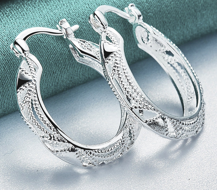 Exquisitely Crafted Hoop Earrings with Intricate Florentine and High Polish Detailing