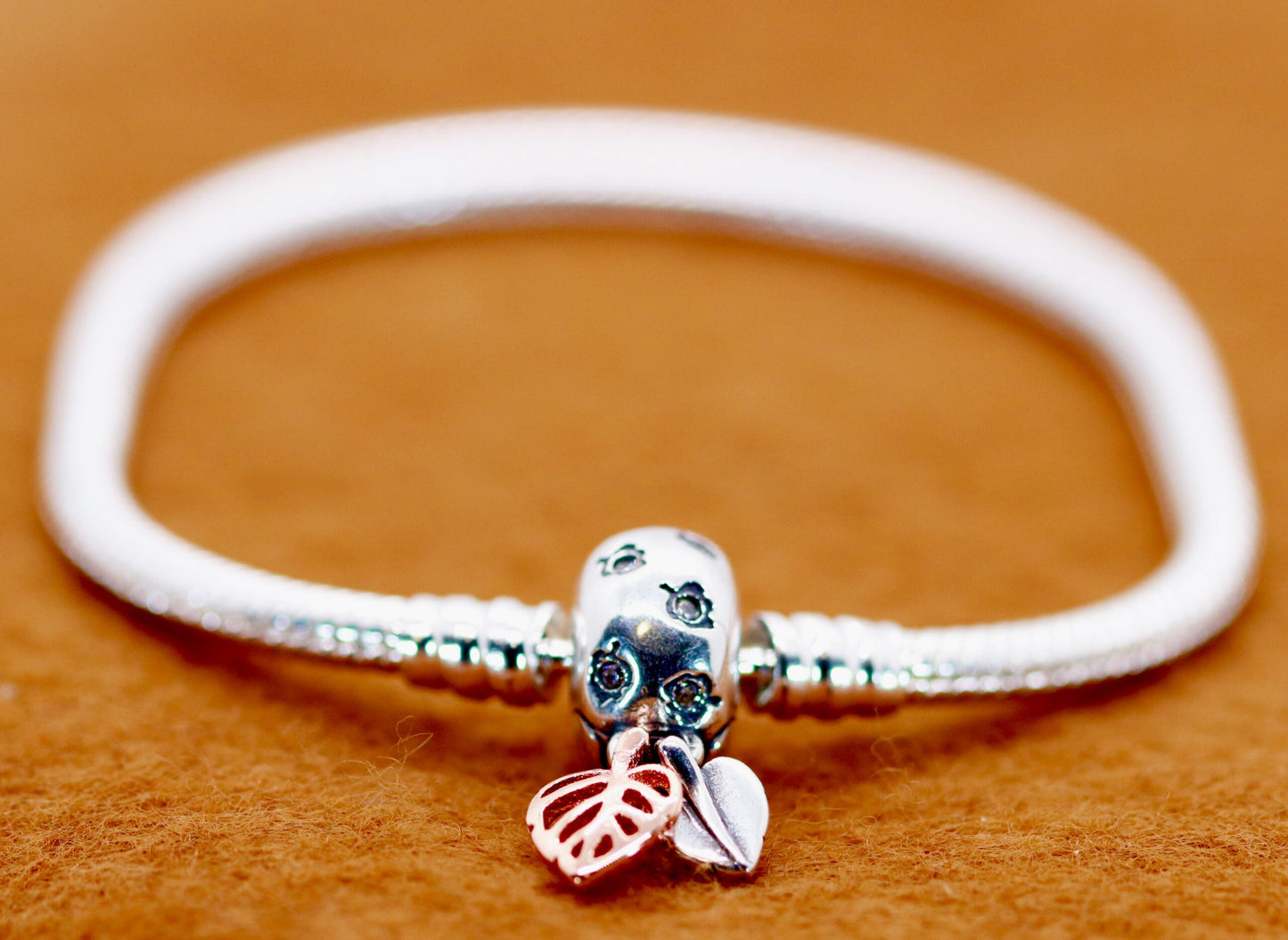 Sterling Silver Flexible Snake Charm Bracelet with Crab Accented with Blue Stone, Open Heart Charm, And Solid Heart Shaped Bead Charms Accented with High Polished Clasp CZ &amp; Two Hanging Leaves