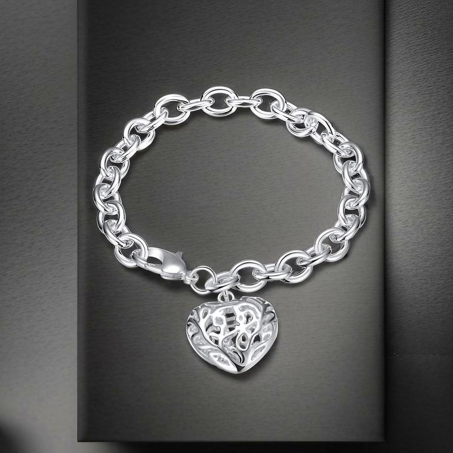 Classic Sterling Silver Charm Bracelet with Elegant Filigree Heart Charm