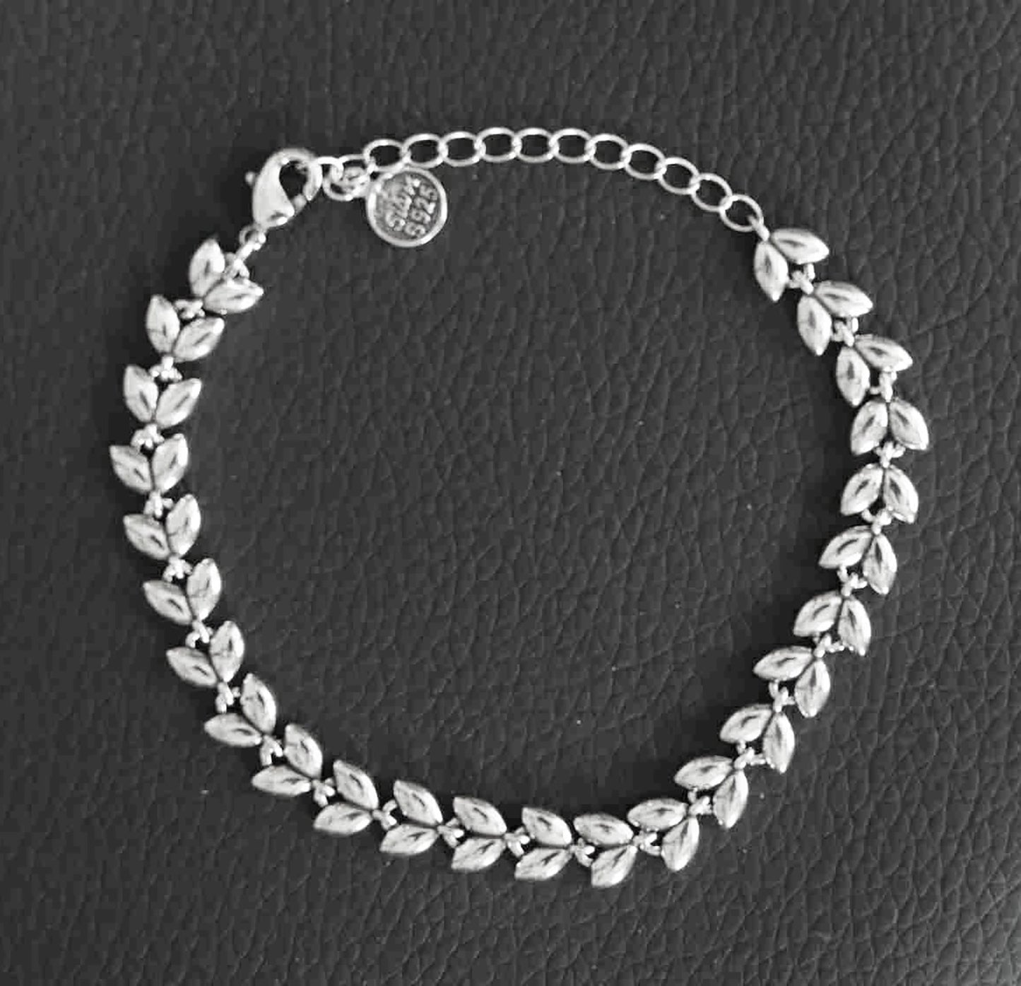 Lustrous Chevron Flow Sterling Silver Bracelet – Platinum-Look Modern Elegance