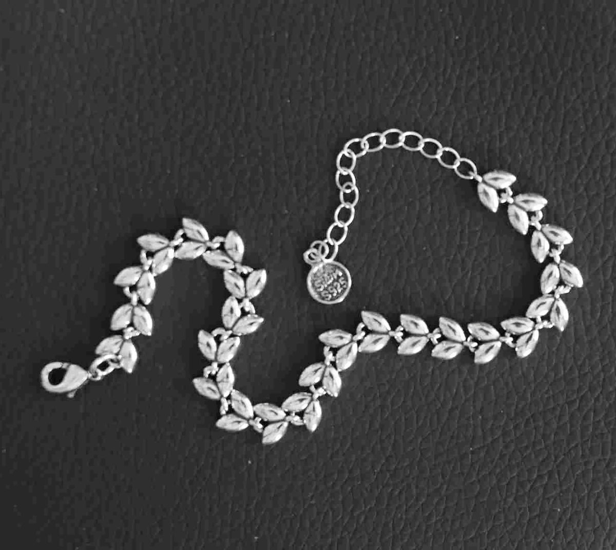 Lustrous Chevron Flow Sterling Silver Bracelet – Platinum-Look Modern Elegance