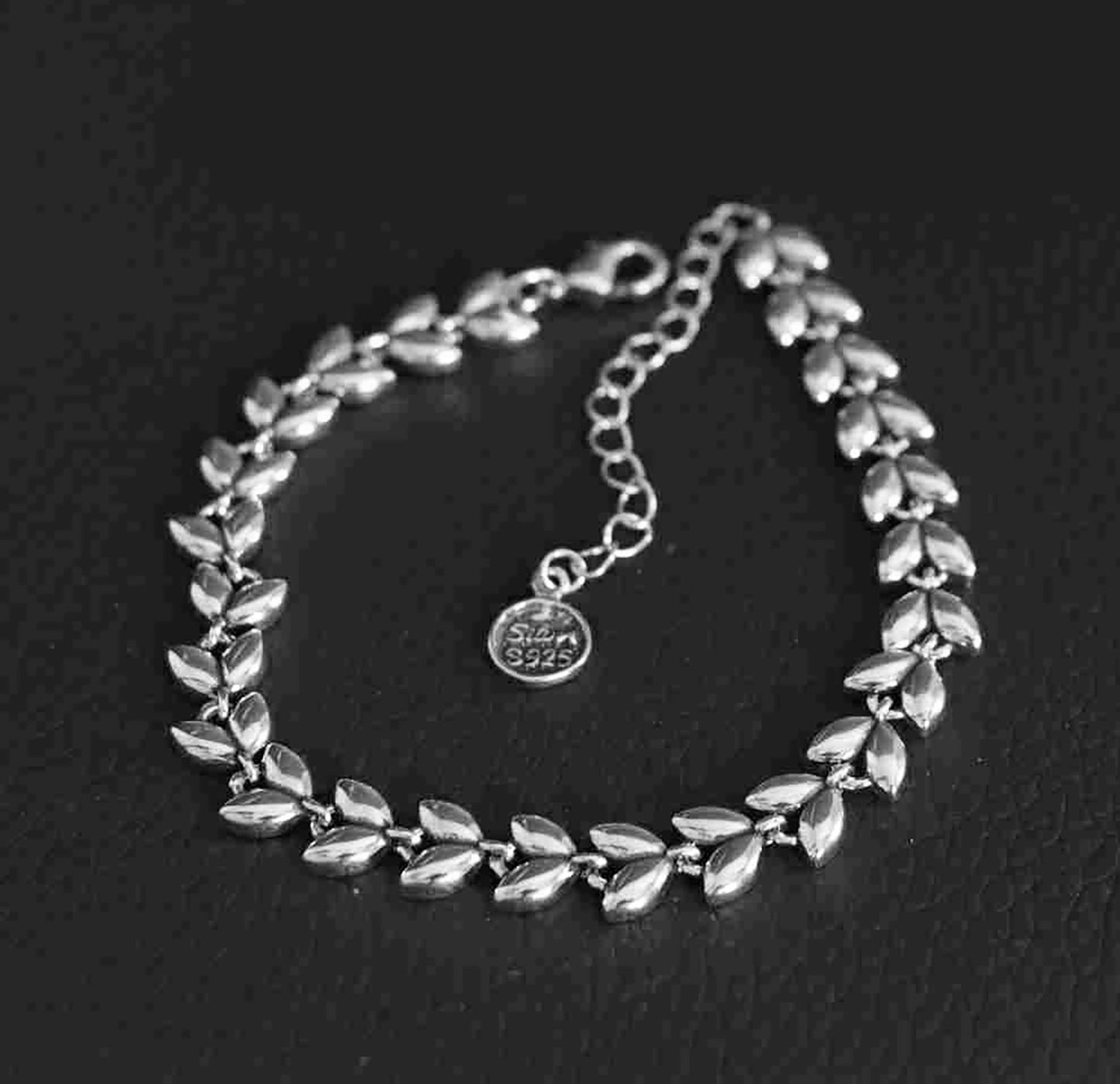 Lustrous Chevron Flow Sterling Silver Bracelet – Platinum-Look Modern Elegance