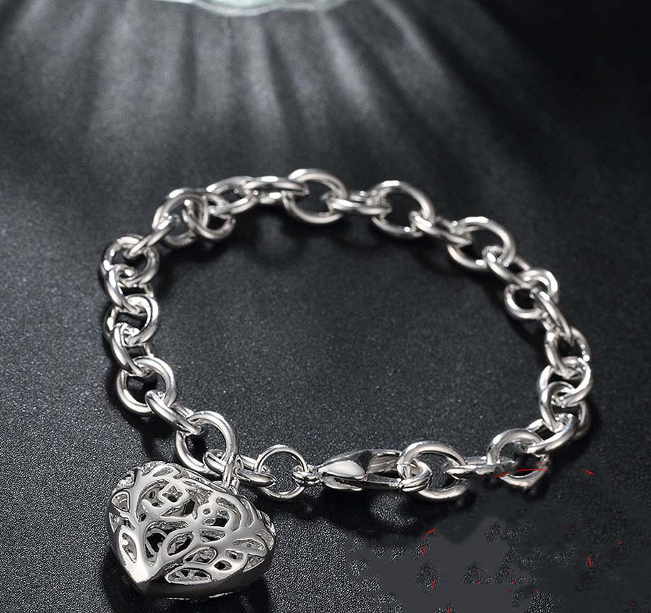 Classic Sterling Silver Charm Bracelet with Elegant Filigree Heart Charm