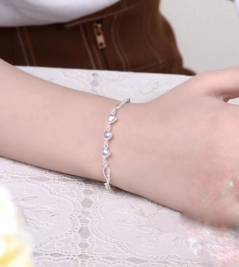 Elegant Sterling Silver Heart and Angel Wing Bracelet