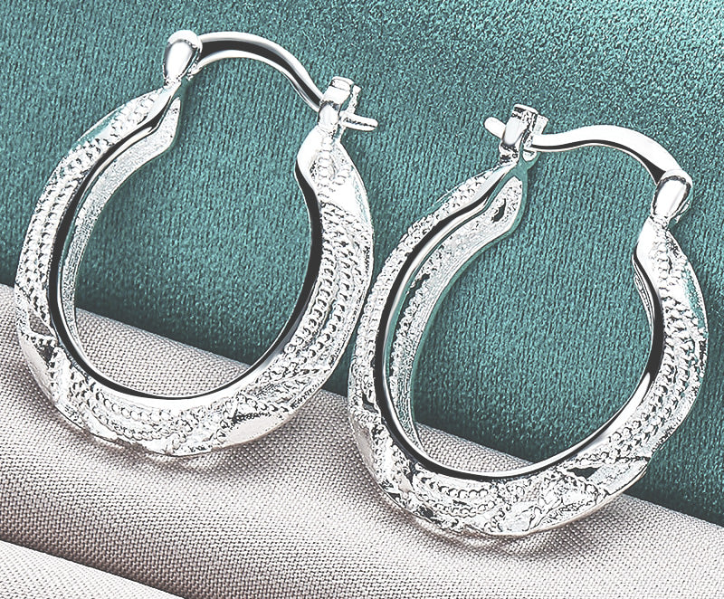 Exquisitely Crafted Hoop Earrings with Intricate Florentine and High Polish Detailing