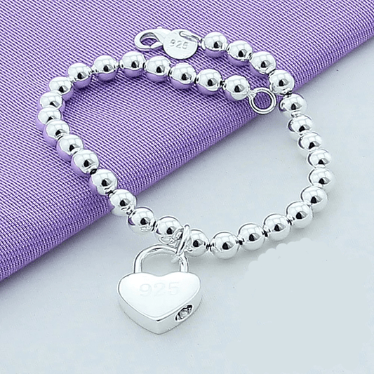 Sterling Silver 5mm Single Strand of High Polish Beads With Puffed High Polish Heart Charm Bracelet